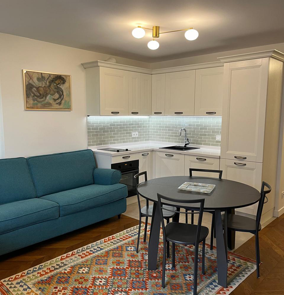 Kitchen by Arredo3, sofa by Samoa